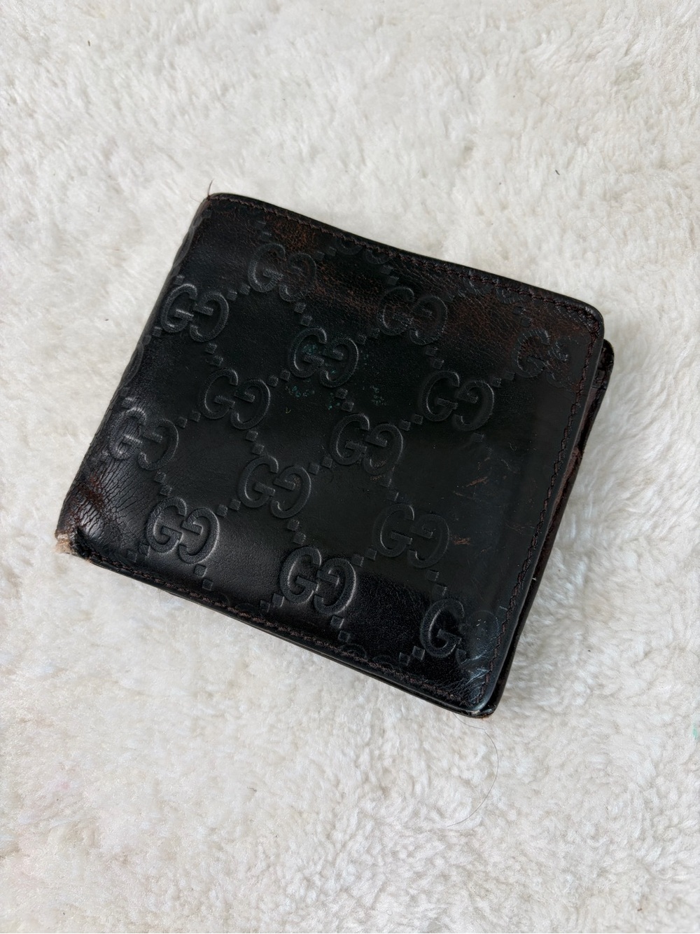 Gucci Black Embossed GG Leather Bi-Fold Wallet